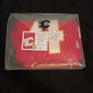 Fanatics Red and Yellow NHL Jersey autographed by RASMUS ANDERSSON